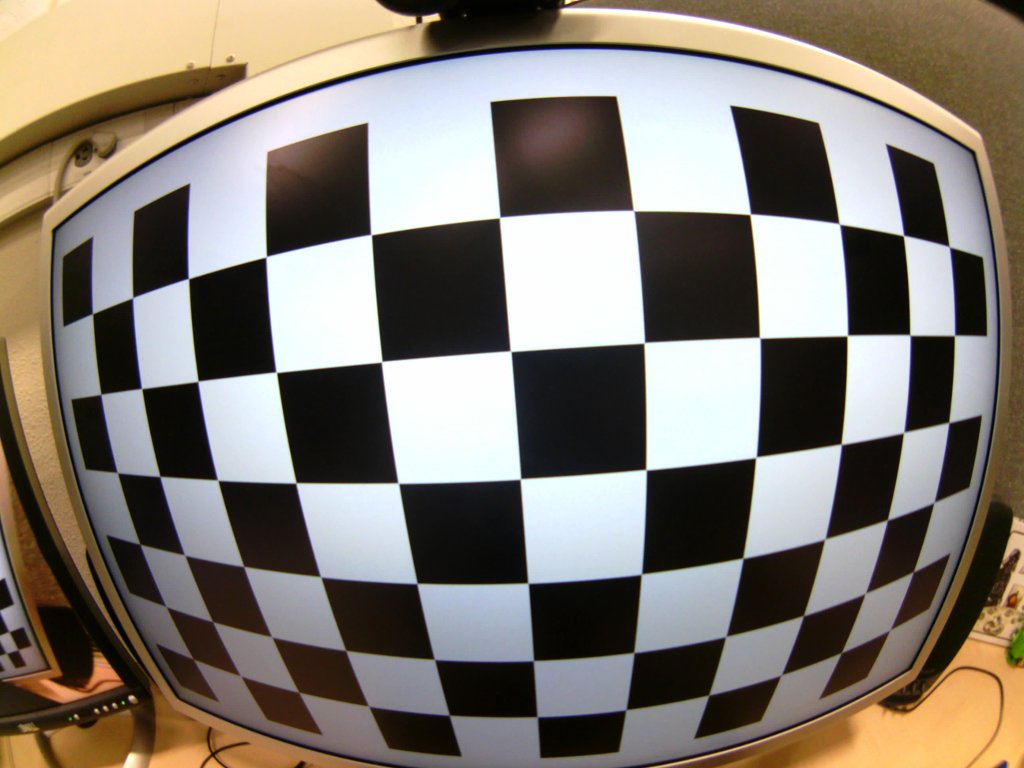 Figure 1: Picture from a fisheye camera, showing a checkerboard calibration target displayed on a 30" LCD monitor.